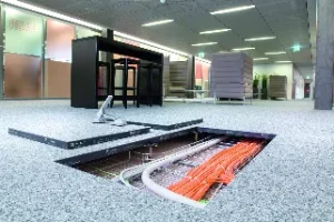 raised floor system with underfloor cable management in office space