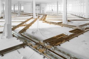 raised floor support structure with underfloor cable management system